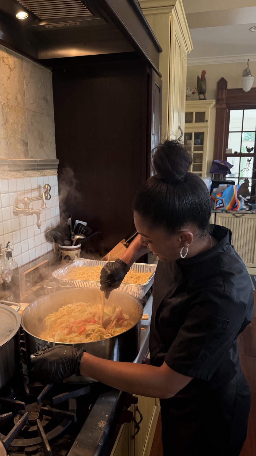 Chef Kai preparing food in a private home kitchen